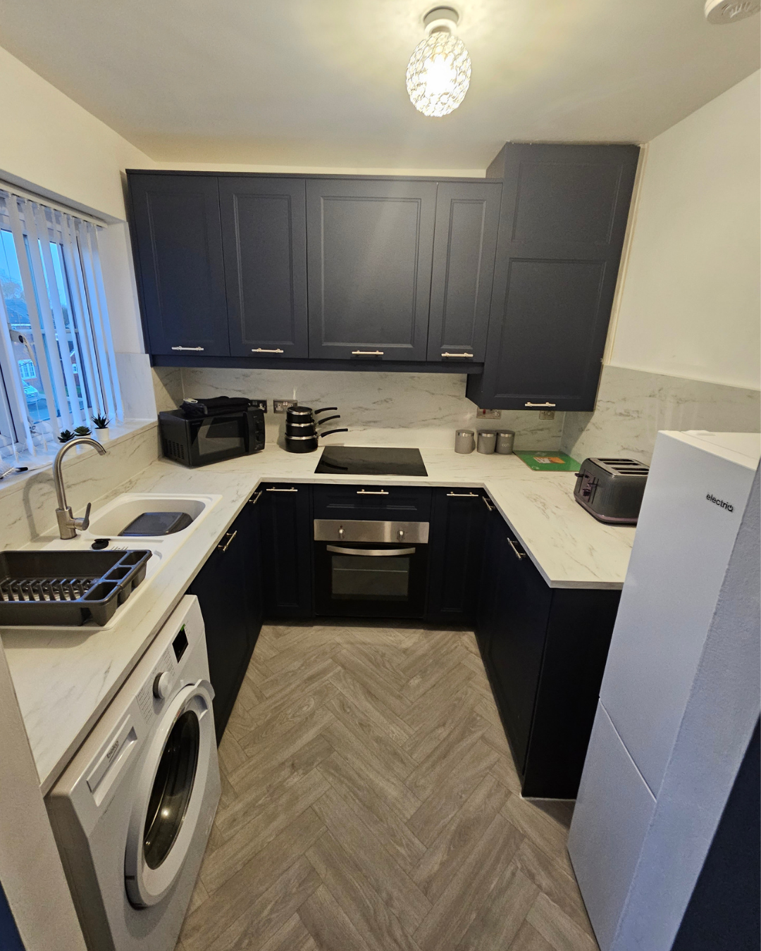 A modern, fully equipped kitchen in one of our supported homes.