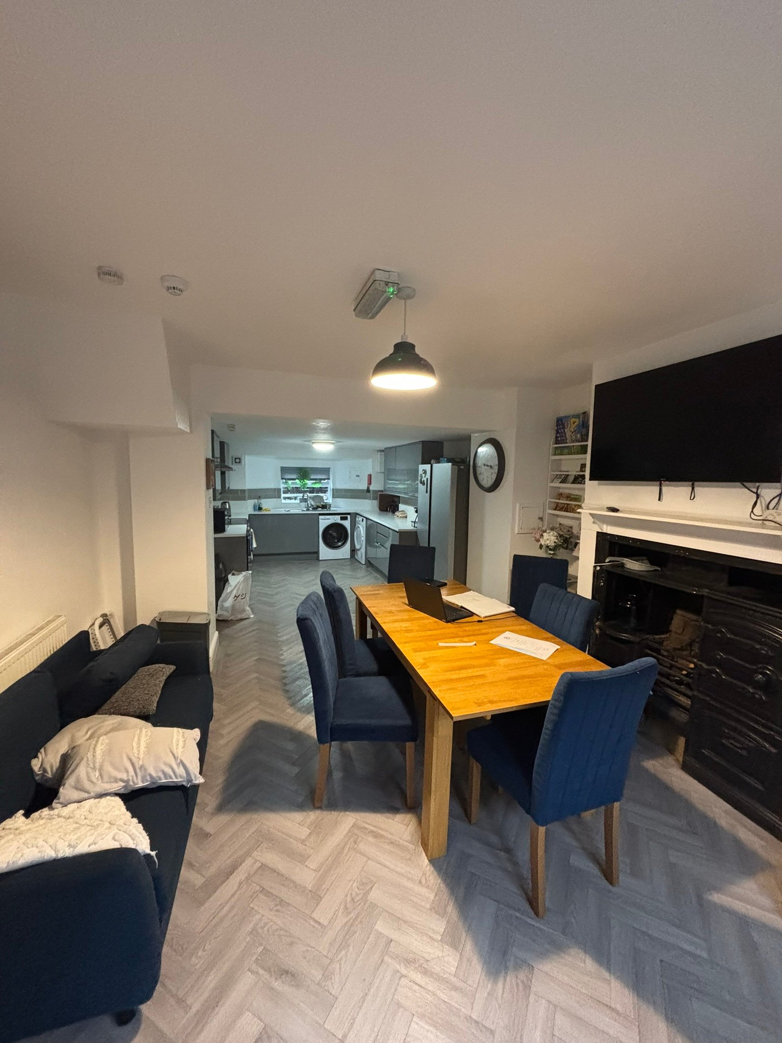 A bright, open-plan living and dining space in one of our homes.