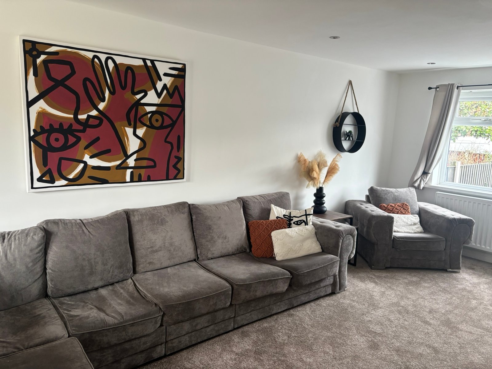 A bright, comfortable living room in one of our homes.